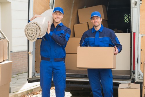Local office relocation team handling equipment in Crossness