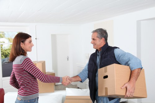 Professional movers handling furniture access in Crossness